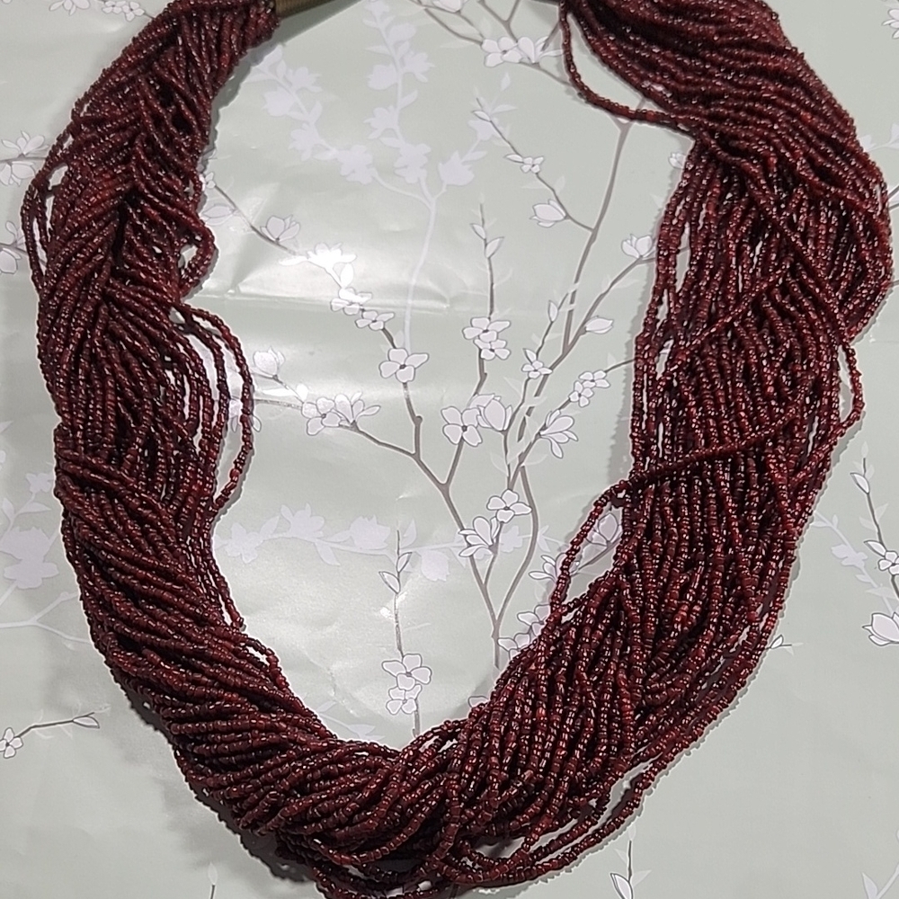 Red Multi-Strand Necklace with Textured Appearance